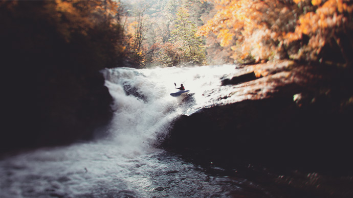 Whitewater kayakers on an advanced section of river (Overflow) in the mountains of Georgia.  