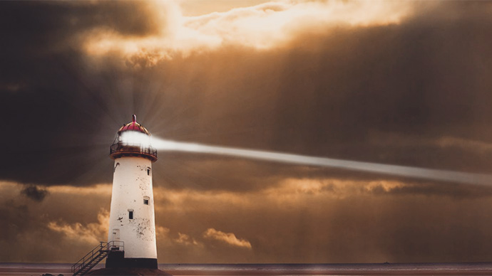 Light house beaming, stormy sky