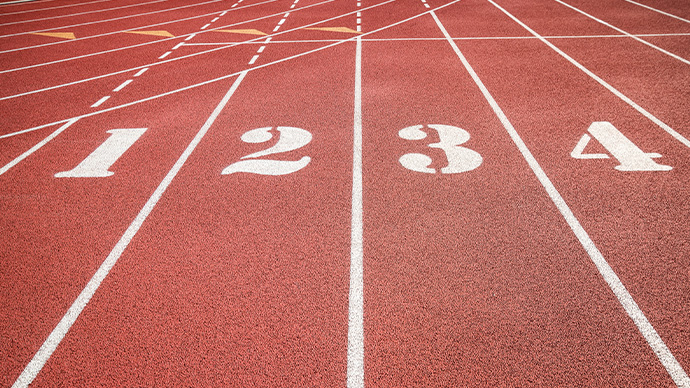 Red running track, track and field or athletics track start line with lane numbers